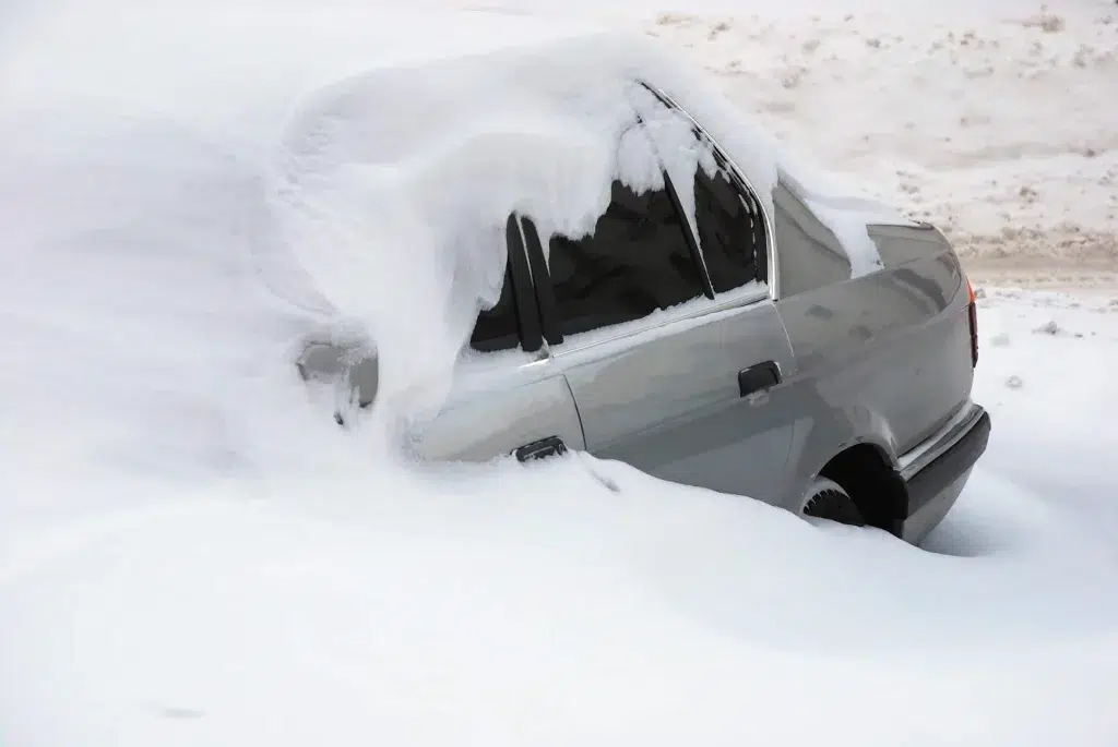 car snow covered prepping